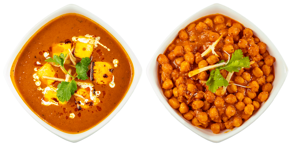 chana masala and shahi paneer curries in a bowl