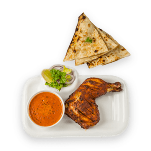 tandoori chicken on a plate with naan
